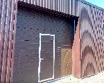 Praėjimo durys garažo vartuose